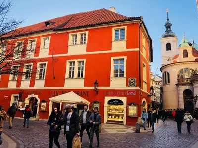 a group of people standing in front of a building at Royal Road Residence II in Prague