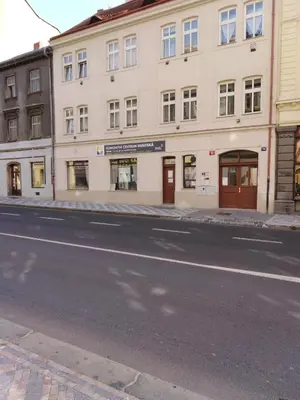 a building on the side of a street at Studio Husitská 114/74 in Prague