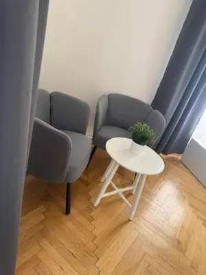 a bedroom with a bed and a large window at Welcome Hostel & Apartments Praguecentre in Prague