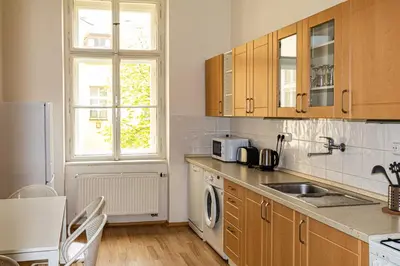 a kitchen with a sink and a microwave at Welcome Hostel & Apartments Praguecentre in Prague