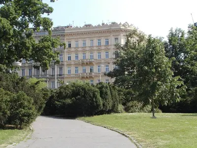 a large building with a path in front of it at Apartments Katarina in Prague