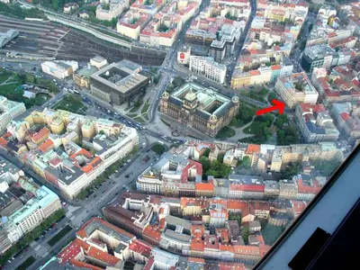 an aerial view of a city with a red arrow at Apartments Katarina in Prague