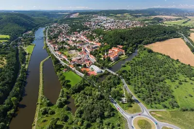 an aerial view of a river and a city at Hotel Restaurant Darwin in Prague