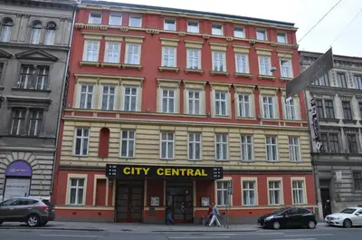 a city central building on the corner of a street at City Central De Luxe in Prague