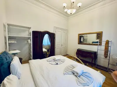 a bedroom with a bed with two towels on it at Platnéřská ,7 in Prague
