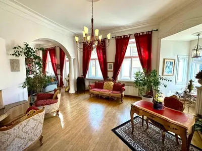 a living room with red furniture and red curtains at Platnéřská ,7 in Prague