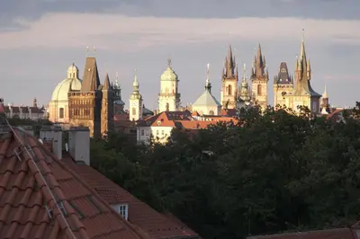 a view of a city skyline with cathedral buildings at Pawlansky Residence in Prague