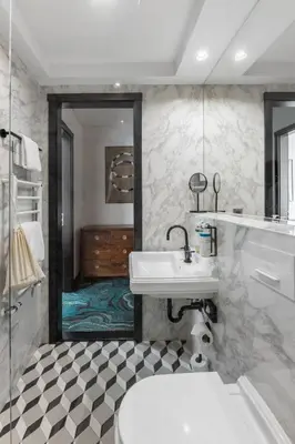 a bathroom with a sink and a mirror at Numa Prague Republika in Prague