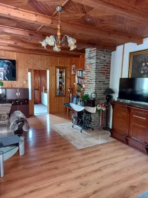 a living room with wood floors and a ceiling at App Tony Beroun in Beroun