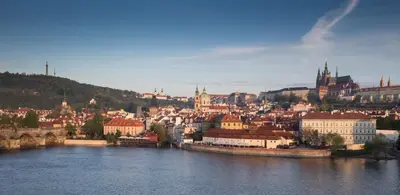 a view of a city with a river and buildings at Four Seasons Hotel Prague in Prague