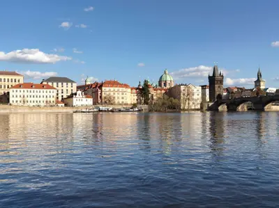 a view of a city with a river and buildings at Four Seasons Hotel Prague in Prague