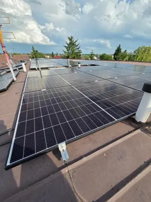 a tennis court with solar panels on it at Hotel Max in Prague