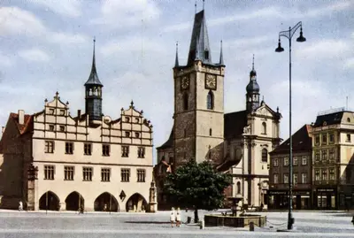 an old photo of a building with a clock tower at U svaté Ludmily in Litoměřice