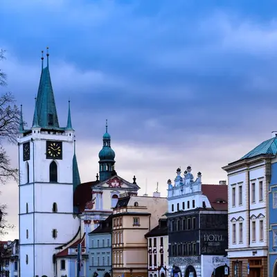 a group of buildings with a clock tower at U svaté Ludmily in Litoměřice