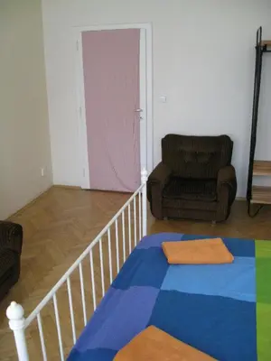 a living room with a couch and a chair at Ragtime in Prague