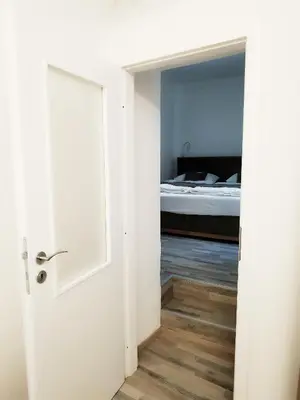 an open door leading to a bedroom with a bed at Hotel Karlova Prague - Mostecka 10 st Depandance in Prague