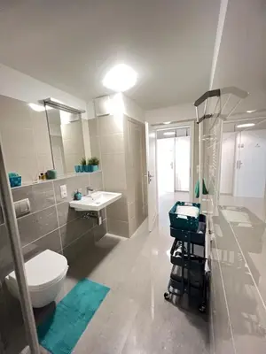 a bathroom with a toilet and a sink at FREE PARKING IN GARAGE Karolina Plazza, new cosy studio with all you need in Prague