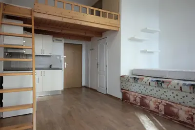a bathroom with a sink and a mirror and a shower at Karlín Praha - Pernerova 18 in Prague