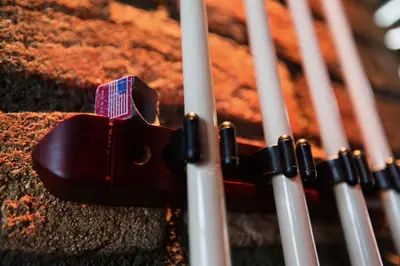a close up of a guitar case next to othersticks at Hotel PULSE8 in Prague