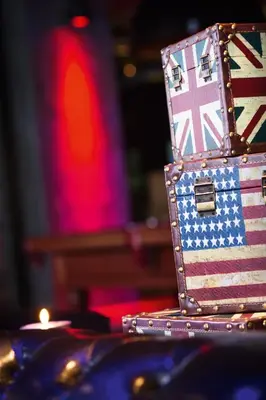 a suitcase with the british flag on it at Hotel PULSE8 in Prague