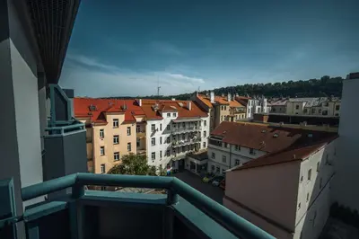 a view of a city from a balcony at Hotel PULSE8 in Prague