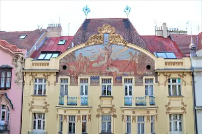 a building with a painting on the side of it at Flowers apartments in Prague