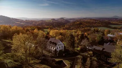 an aerial view of a house in the woods at Vikendovka Korce in Dubá