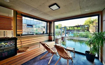 a large bath tub sitting next to a building at Apartment Rezidence La in Prague