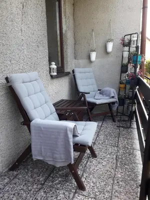 two chairs on a porch with towels on them at Apartment 144 in Kněževes