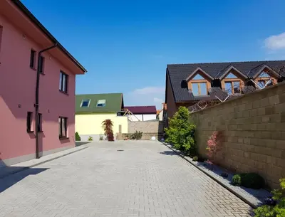 a driveway in a home with pink and yellow at Apartment De Luna in Prague
