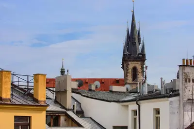 a view of a city with a clock tower at Kolkovna 5 Penthouse in Prague