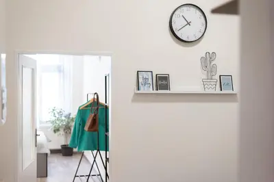 a bedroom with a bed and a window at Prague - Karlin Apartments in Prague