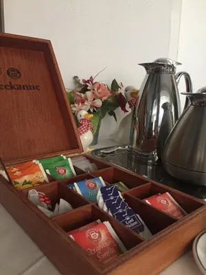 a wooden box filled with different types of food at Hotel-Pension KAMÝK in Prague