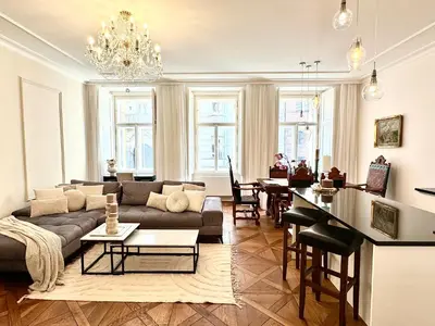 a living room with a couch and a table at Arch III at Wenceslas in Prague