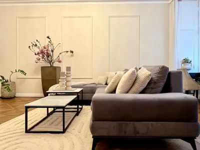 a living room with a couch and a table at Arch III at Wenceslas in Prague