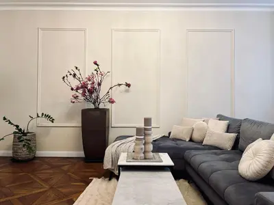 a living room with a couch and a table at Arch III at Wenceslas in Prague