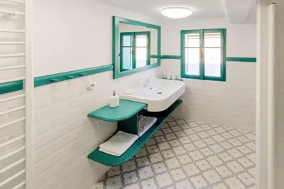 a bathroom with a sink and a mirror at Homutův statek in Kokořín
