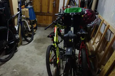 a group of bikes parked in a garage at Apartmán Třebenice - vstupní brána do Českého středohoří in Třebenice