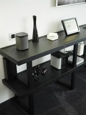a desk with a chair and a desk with a computer at Apartman Grey in Prague