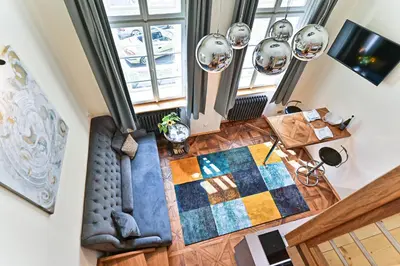 an overhead view of a living room with a table at Apartment Nebovidy II - Air Conditioning - Historic City Center in Prague