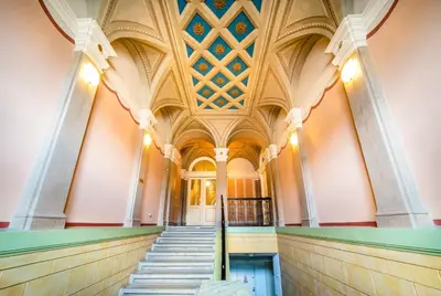 a hallway in a building with a vaulted ceilings at Luxurious Woodrow Wilson apt in Prague centre in Prague