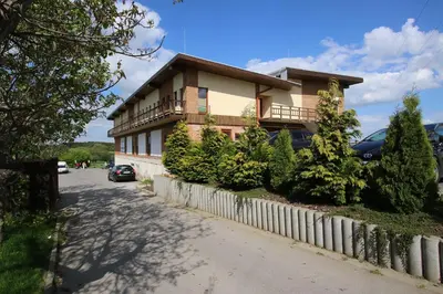 a house on the side of a road at Areal Botanika in Unhošť