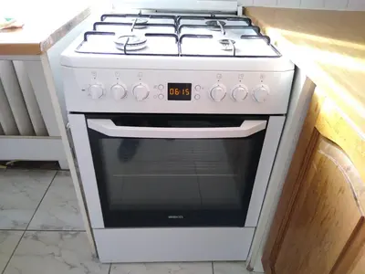 a white stove top oven in a kitchen at Rooms in Prague-BIG+Comfy in Prague