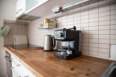 a coffee maker on a counter in a kitchen at Apartment Tereza in Prague