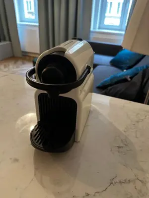 a hair dryer sitting on top of a table at Downtown Residence in Prague