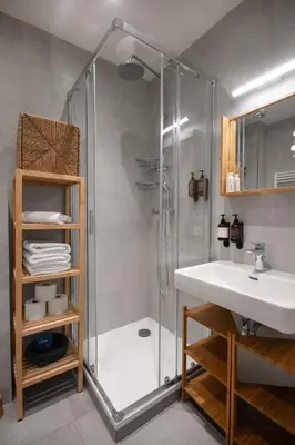 a bathroom with a shower and a sink at Downtown Residence in Prague