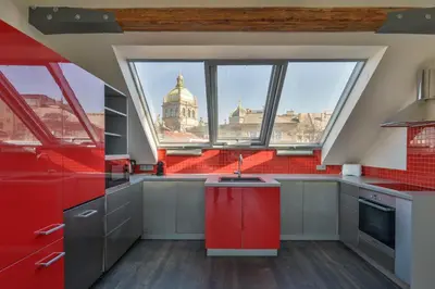 a kitchen with a view of a building at Designer Loft in Prague