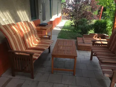 a group of benches sitting on a patio at Adela´s Czech Village House in Všejany