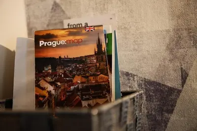 a book sitting on top of a wall at Snajder Apartment, 15min to Old Centre, Self-check in, Free Wifi in Prague