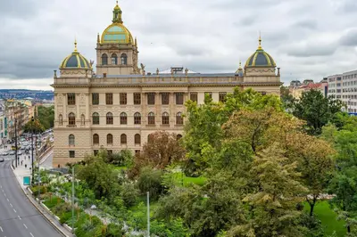 a building with gold domes on the top at Open Gate in Prague